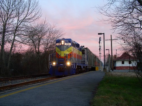 Bay Colony RR GP9 number 1705 leads the northbound trash train through West Barnstable